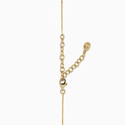 The Mosaic 14K Yellow Gold Multi Color Gemstone and Diamond Collar Bone Bar Necklace features a horizontal bar pendant set with five baguette-cut rainbow gemstones: red, purple, blue, green, and yellow.