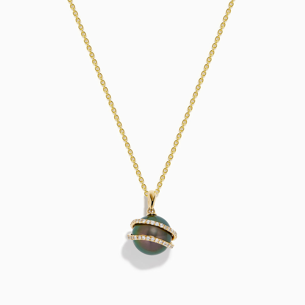 The 14K Yellow Gold Black Tahitian Pearl and Diamond Pendant features a spherical black pearl encircled by two diagonal gold bands set with small diamonds, shown against a white background.