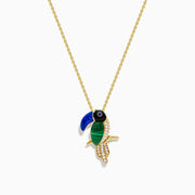A 14K yellow gold chain necklace with a Multi Gemstone and Diamond Toucan Pendant, featuring a blue beak, green and black accents, and sparkling clear stones on its body, shown against a white background.