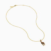 The Safari 14K Yellow Gold Tiger Eye Giraffe Pendant showcases a charming giraffe with brown and white enamel details and a green head accent, set against a plain white background.
