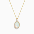 The 14K Yellow Gold Opal and Diamond Pendant features a delicate yellow gold chain with an oval opal center, accented by a halo of sparkling diamonds.