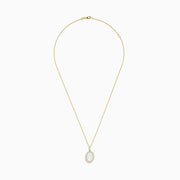 The 14K Yellow Gold Opal and Diamond Pendant features a delicate yellow gold chain with an oval opal center, accented by a halo of sparkling diamonds.