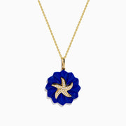 The Seaside 14K Yellow Gold Lapis and Diamond Starfish Pendant features a lapis flower-shaped design and a diamond-accented starfish with white crystal details at the center.