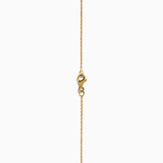 The 14K Yellow Gold Citrine and Diamond Halo Pendant features a round citrine center with a diamond halo, set on a gold chain and displayed against a white background.