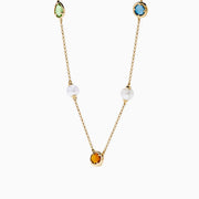 The Mosaic 14K Yellow Multi Color Gemstone and Fresh Water Pearl Station Necklace features evenly spaced blue, orange, and green gemstones with fresh water pearls on a gold chain, displayed on a white background.