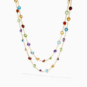 The Mosaic 14K Yellow Gold Multi Color Gemstone and Diamond Necklace features a delicate gold chain adorned with beautifully spaced round gemstones in blue, green, purple, red, and yellow.