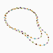 The Mosaic 14K Yellow Gold Multi Color Gemstone and Diamond Necklace features a delicate gold chain adorned with beautifully spaced round gemstones in blue, green, purple, red, and yellow.