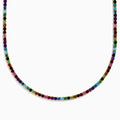 The 14K Yellow Gold Multi-Gemstone Rainbow Tennis Necklace features small, round gemstones spaced along its length and is shown on a white background.