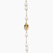 The 14K Yellow Gold Tahitian and Freshwater Pearl Necklace features alternating white and dark pearls on a delicate gold chain, beautifully displayed against a white background.