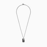 The Mens 925 Sterling Silver Onyx Flag Dog Tag Pendant features a rectangular design with black onyx and a silver stylized American flag displaying four stars and six vertical stripes.