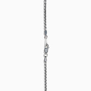 The Men's Sterling Silver Onyx Dog Tag Pendant features a simple rectangular onyx set in sterling silver, suspended from a chain and displayed against a plain white background.