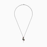 The Splash Sterling Silver Multi Sapphires Flamingo Pendant features a one-legged flamingo adorned with vibrant red, blue, green, yellow, orange, and white gemstones on a sterling silver chain necklace.