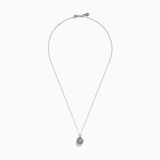 The 14K White Gold Tahitian Pearl and Diamond Pendant showcases a round Tahitian pearl with three sparkling diamonds above it, all set in lustrous white gold and displayed against a plain white background.