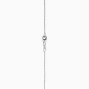 The Aquarius 14K White Gold Aquamarine and Diamond Halo Pendant features a rectangular faceted aquamarine surrounded by a sparkling diamond halo, elegantly suspended from a fine white gold chain.