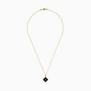 The 14K Yellow Gold Garnet and Diamond Pendant features a four-petal flower-shaped garnet with deep red gemstones outlined in yellow gold and a small clear diamond at the center, shown on a white background.