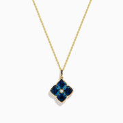 The Ocean Bleu 14K Yellow Gold London Blue Topaz and Diamond Pendant features a clover-shaped design with four London Blue Topaz gemstones and a central diamond on a yellow gold chain necklace.