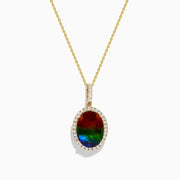 The 14K Yellow Gold Ammolite and Diamond Pendant features an oval red-green ammolite surrounded by clear diamonds on a delicate chain, elegantly displayed against a white background.