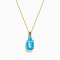 The Ocean Bleu 14K Yellow Gold Blue Topaz Pendant features an emerald-cut blue topaz in gold prongs, showcased on a gold chain against a white background.