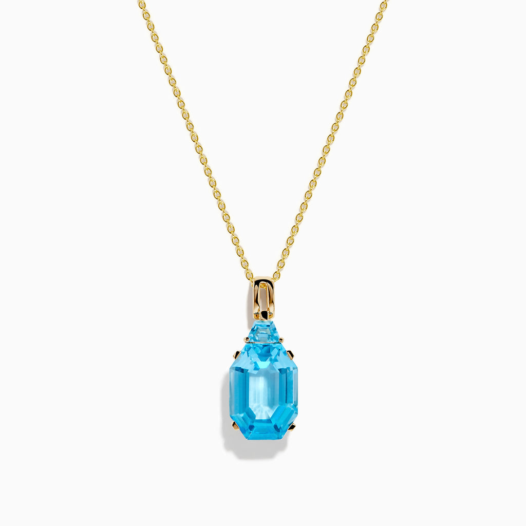The Ocean Bleu 14K Yellow Gold Blue Topaz Pendant features an emerald-cut blue topaz in gold prongs, showcased on a gold chain against a white background.