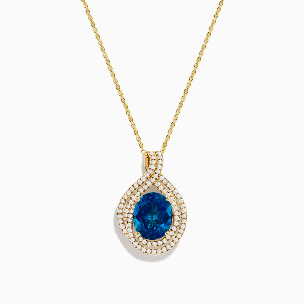 The Ocean Blue 14K Gold London Blue Topaz and Diamond Pendant features an oval-shaped topaz with a diamond teardrop design, accented by two rows of sparkling white diamonds.