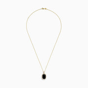 The Eclipse 14K Yellow Gold Onyx and Diamond Pendant features a rectangular onyx with a diamond border and diamond-encrusted bail, set in yellow gold, displayed on a plain white background.