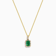 The Brasilica 18K Yellow Gold Emerald and Diamond Pendant features an emerald-cut green gemstone surrounded by small diamonds, showcased on a chain against a plain white background.
