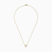 The Aurora 14K Yellow Gold Opal and Diamond Necklace features a round opal pendant encircled by diamonds, with extra diamond accents on the chain—an elegant accessory for any occasion.