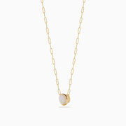The 14K Yellow Gold Opal Bezel Paperclip Chain Pendant features a single round white opal in a simple, elegant bezel setting on a delicate yellow gold chain.