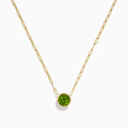The 14K Yellow Gold Peridot Bezel Pendant with Paperclip Chain features elongated links and a round, faceted peridot set in a simple bezel setting.