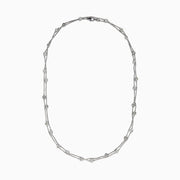 The 14K White Gold 36 Inch 3.00ct Diamond Station Necklace features a white gold chain with evenly spaced round bezel-set diamonds for a timeless, elegant look.