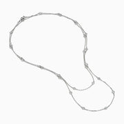 The 14K White Gold 36 Inch 2.00ct Diamond Station Necklace showcases round bezel-set diamonds evenly spaced along a fine chain, presented on a plain white background.