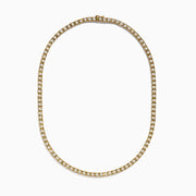The 14K Yellow Gold Miracle Set Diamond Tennis Necklace, featuring an intricate pattern and embedded diamonds, is displayed against a white background.