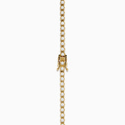 The 14K Yellow Gold Miracle Set Diamond Graduated Tennis Necklace showcases a single row of closely set, sparkling round diamonds in a gentle curve on yellow gold.