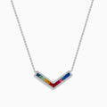 The Watercolors 14K White Gold Multi Sapphire and Diamond Collarbone Necklace features a V-shaped pendant with square, multicolored sapphires in a rainbow pattern, bordered by sparkling diamonds.