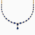 The Royale Bleu 14K Yellow Gold Blue Sapphire and Diamond Necklace features alternating teardrop-shaped blue sapphires and round diamonds, with three larger blue stones in a central drop design.
