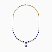The Royale Bleu 14K Yellow Gold Blue Sapphire and Diamond Necklace features alternating teardrop-shaped blue sapphires and round diamonds, with three larger blue stones in a central drop design.
