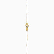 The Bordeaux 14K Yellow Gold Garnet and Diamond Heart Necklace features a heart-shaped red garnet pendant accented by two round diamonds on a delicate gold chain.