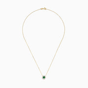 The Brasilica 14K Yellow Gold Emerald and Diamond Necklace features a round green emerald pendant with sparkling diamonds in a flower shape, set in white metal on a delicate gold chain.