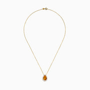 The Sunset 14K Yellow Gold Citrine and Diamond Pear Pendant features a pear-shaped citrine surrounded by sparkling diamonds on a yellow gold chain, displayed against a white background.