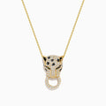 The Signature 14K Yellow Gold Diamond and Emerald Panther Pendant features a panther adorned with diamonds and emeralds, its mouth gripping a diamond-studded circular ring, suspended from a yellow gold chain necklace.