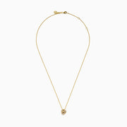 The 14K Yellow Gold Diamond Love Knot Pendant features intertwined loops with small, sparkling diamonds, creating an elegant look. Shown against a white background on a gold chain necklace.