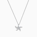 The Novelty 14K White Gold Diamond Starfish Pendant features a starfish-shaped design encrusted with sparkling diamonds, beautifully displayed on a plain white background.