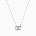 The 14K White Gold Diamond Accented Interlocking Hearts Necklace features two intertwined hearts—one with sparkling diamond accents, the other polished smooth—set on a plain white background.
