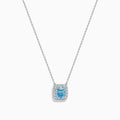 The Lab Grown Blue and White Diamond Halo Necklace in 14K White Gold features a square blue and white diamond pendant surrounded by clear stones, elegantly displayed against a white background.