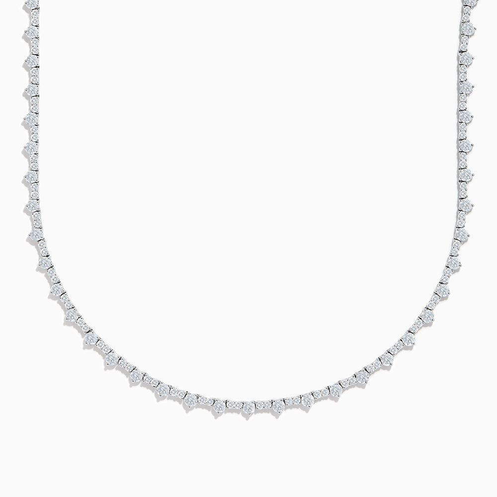 The Lab Grown Diamond Tennis Necklace in 14K White Gold showcases a continuous row of closely set round lab grown diamonds, elegantly displayed on a plain white background.