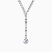 The Lab Grown Round Diamond 8.97ct Lariat Necklace in 14K White Gold features a Y-shaped line of lab grown diamonds ending in a larger single diamond, shown on a white background.