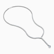 The Lab Grown Round Diamond 8.97ct Lariat Necklace in 14K White Gold features a Y-shaped line of lab grown diamonds ending in a larger single diamond, shown on a white background.