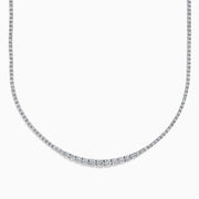 The Lab Grown Round Diamond 5.00ct Graduated Tennis Necklace in 14K White Gold features sparkling round diamonds in a slender white gold chain, displayed elegantly against a white background.