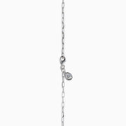 The Lab Grown Diamond Lariat Tennis Necklace in 14K White Gold showcases alternating round and rectangular lab grown diamonds, ending with a pear-shaped drop for an elegant, symmetrical look.