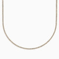 The Lab Grown Diamond 4.9ct Tennis Necklace in 14K Yellow Gold features small, evenly spaced lab grown diamonds in a continuous sparkling line, shown against a plain white background.